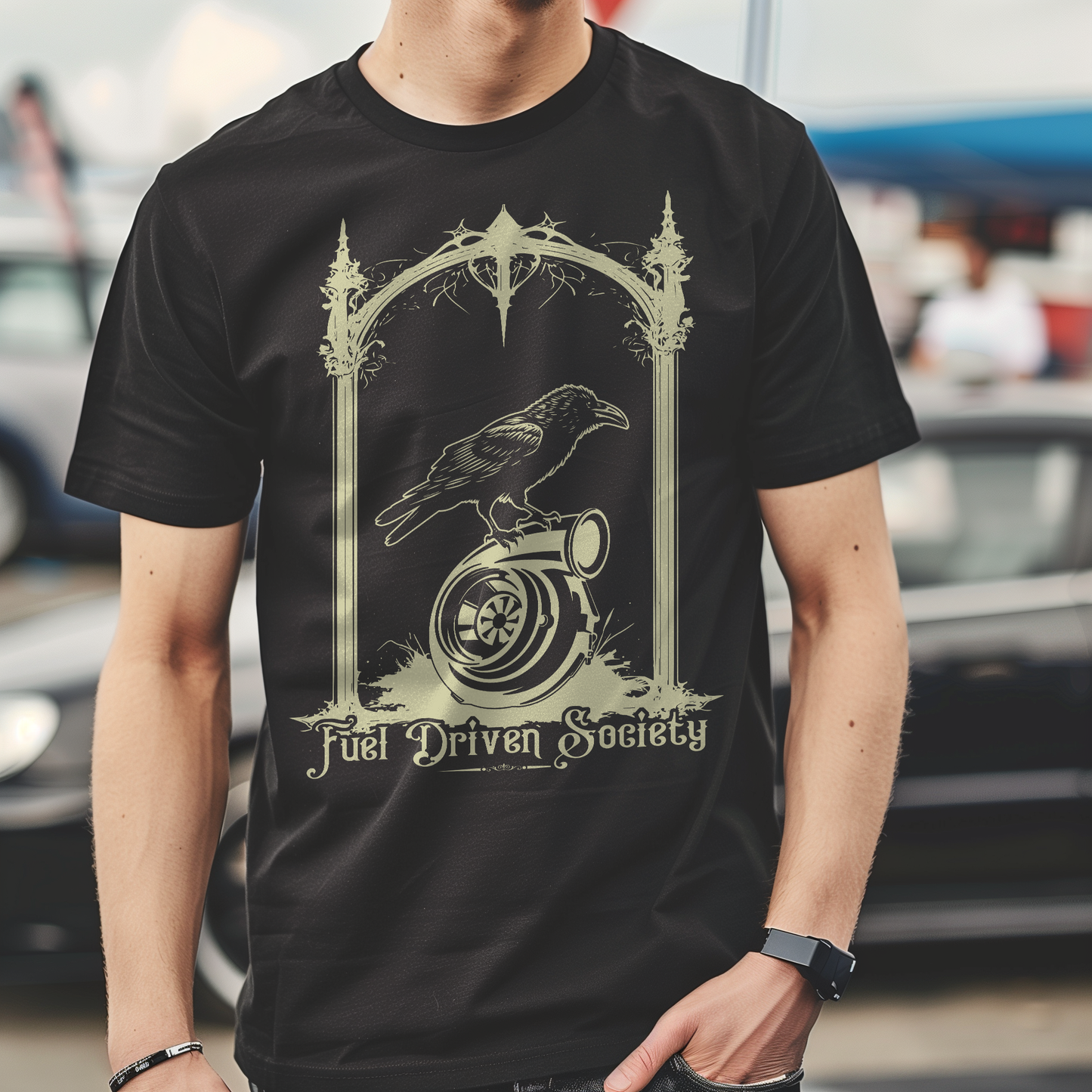 Live mockup of Fuel Driven Society's Turbo Raven Tee being worn, showcasing the detailed design of a raven on a turbo in a gothic style, perfect for car culture enthusiasts